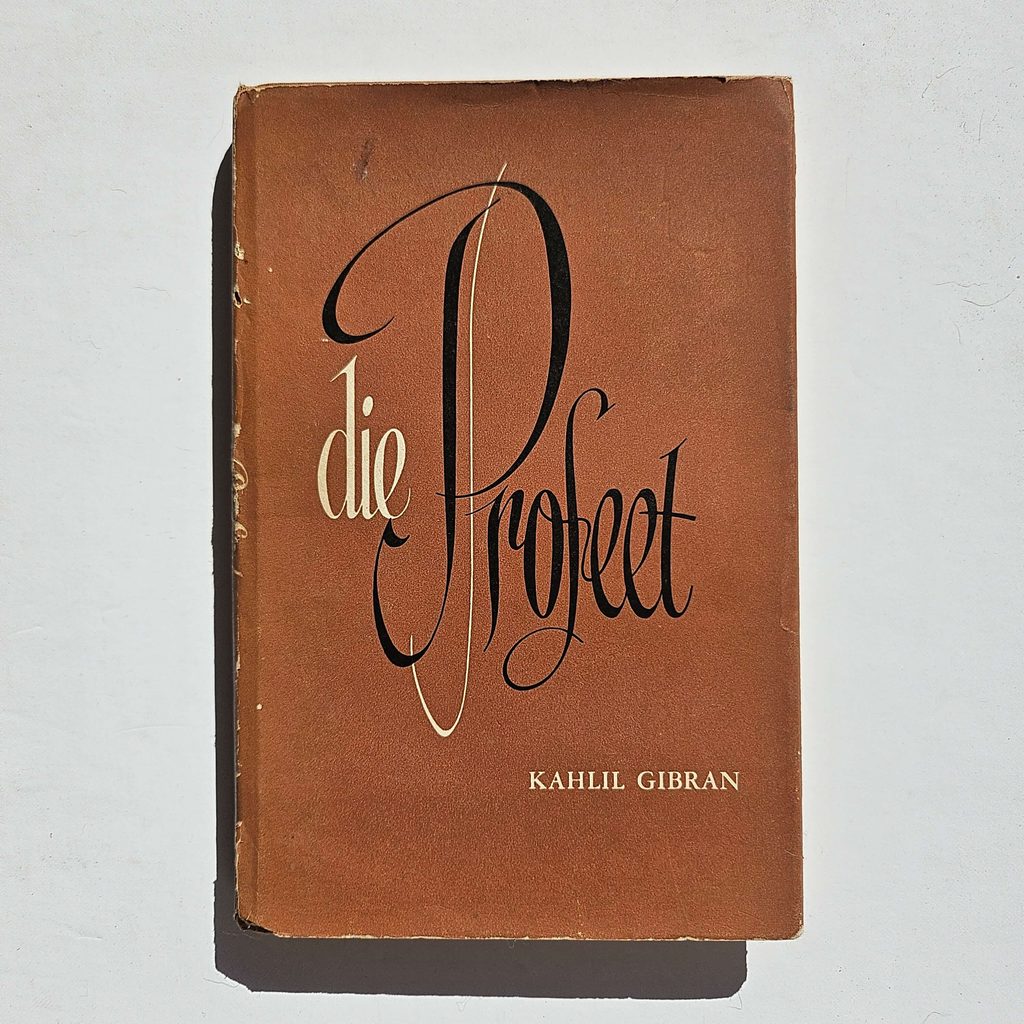 This image shows an older secondhand book with a dustjacket showing some wear and tear, but overall the book is still in good condition.